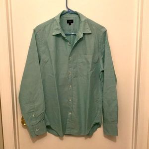 Blue green, button down shirt.